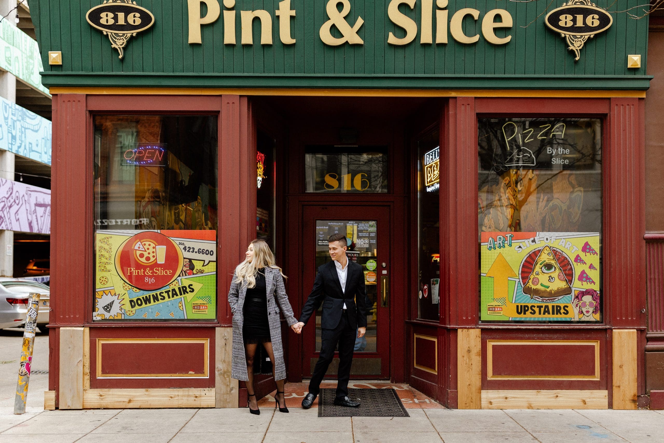Kaila and Blake exploring through downtown Fort Wayne during their winter engagement session