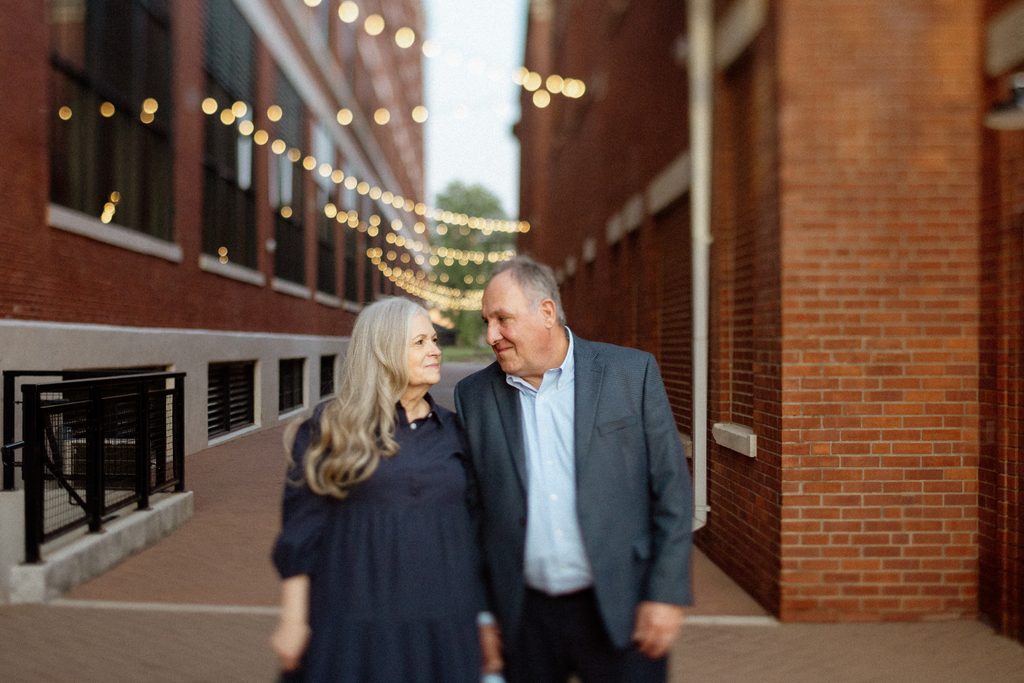 **Alt text:** Brenda and Walter during their anniversary couples session at Electric Works in Fort Wayne, Indiana, photographed by Meg Thompson.
