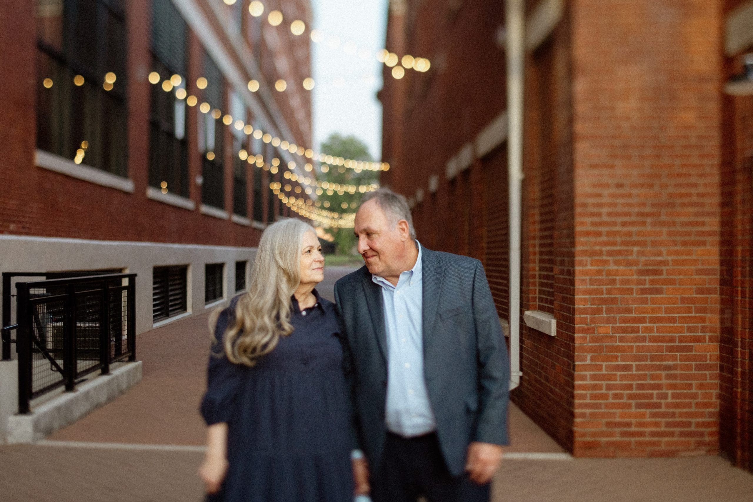**Alt text:** Brenda and Walter during their anniversary couples session at Electric Works in Fort Wayne, Indiana, photographed by Meg Thompson.